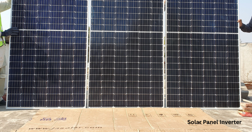 A detailed shot of JA Solar high efficiency solar panels set up on a rooftop for installation. This solar panel inverter system is shown in progress, designed to convert captured sunlight into usable AC power.