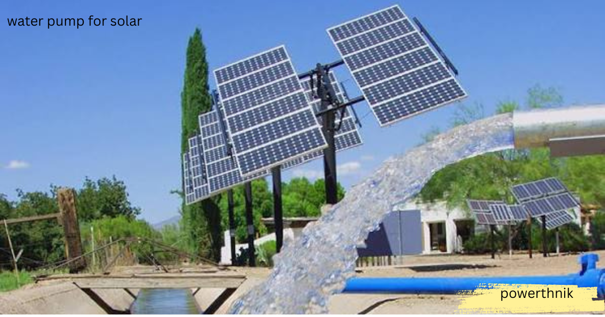 Water pump for solar system with tilted solar panels pumping water through a blue pipe on a farm