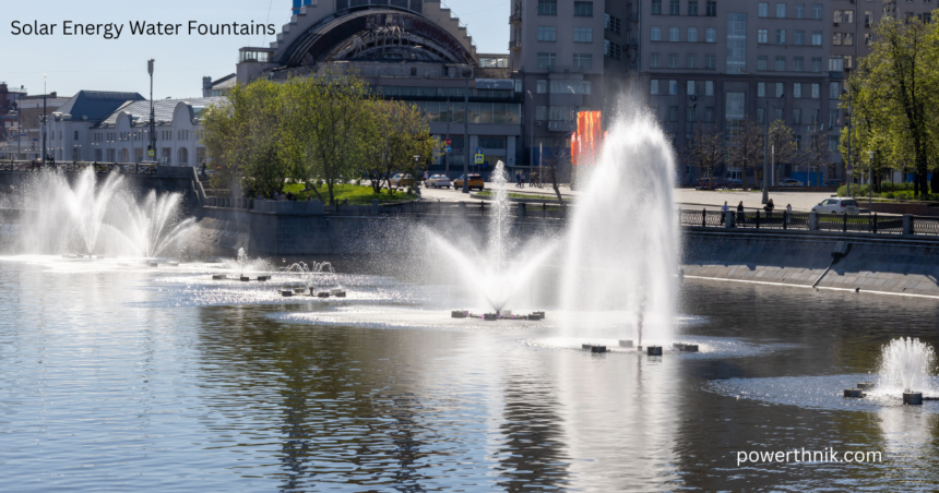 Solar energy water fountains with cascading water in a landscaped UK garden