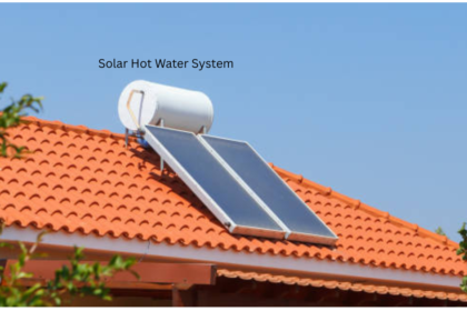 Roof mounted solar hot water system with evacuated tube collectors and cylinder tank on a UK style tiled roof