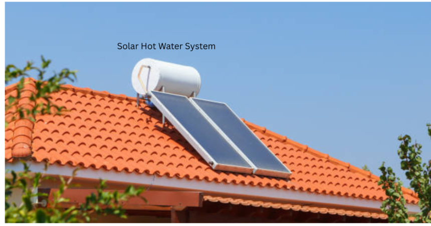 Roof mounted solar hot water system with evacuated tube collectors and cylinder tank on a UK style tiled roof