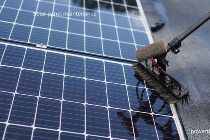 Solar panel maintenance being performed with a soft-bristle brush and pure water pole system on a rooftop panel array