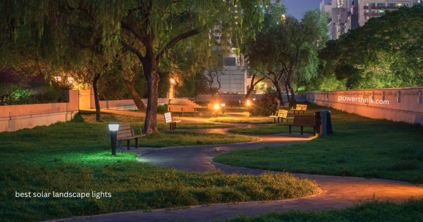 Best solar landscape lights illuminating a garden pathway with benches at night