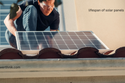 Technician installing a rooftop solar panel to maximize the lifespan of solar panels