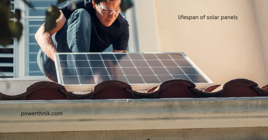 Technician installing a rooftop solar panel to maximize the lifespan of solar panels