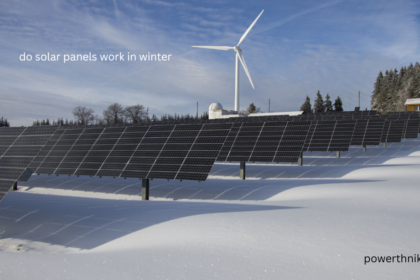 Large solar panel array generating electricity in a snowy field with wind turbine during winter