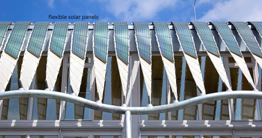 Flexible solar panels installed at angled intervals along a modern building's roofline.
