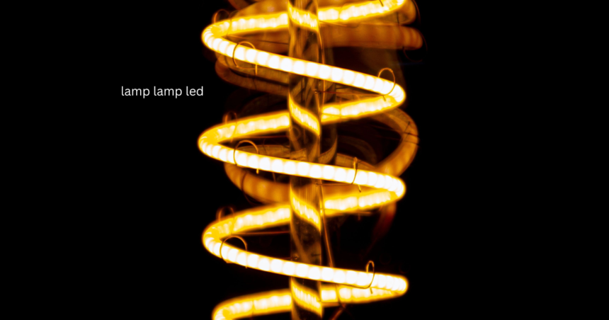 Lamp Lamp LED spiral filament bulb glowing with warm golden light in the dark