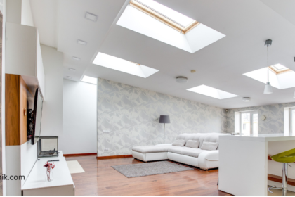 Modern living room interior explaining what is a skylight and how it brings natural light indoors.